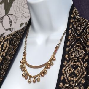 Elegant Gold Necklace with Beaded Charms